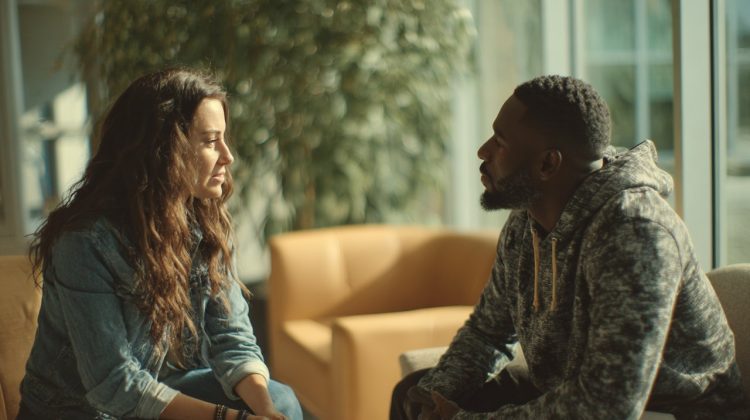 Two people in empathetic coaching session